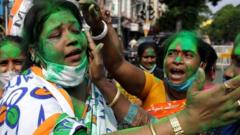 TMC supporters celebrate their party's win in West Bengal
