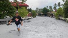 ‘Cold lava’ floods Philippines village after eruption