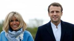 French President Emmanuel Macron and his wife Brigitte Macron