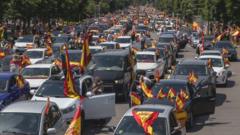 Cars take part in the protest against the lockdown