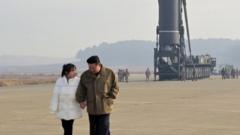 Kim Jong with his daughter
