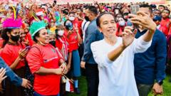 Jokowi menghadiri peluncuran Papua Football Academy di Stadion Lukas Enembe, Kabupaten Jayapura. 
