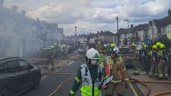 Six terraced houses damaged in fire