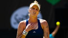Wimbledon champion Vondrousova suffers injury scare