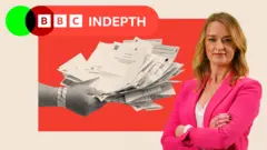 A hand holds ballot papers and Laura Kuenssberg is pictured on the right