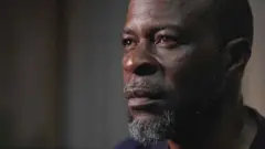 A close-up of the face of Richard Itoro