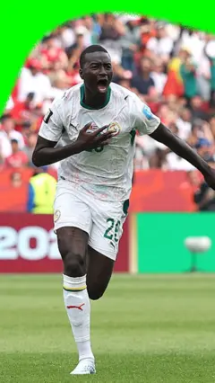 Pape Gueye celebrates