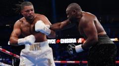 Veteran Chisora outpoints Joyce in London slugfest