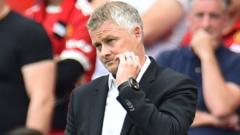 Manchester United boss Ole Gunnar Solskjaer reacts after his side's Premier League home defeat to Aston Villa