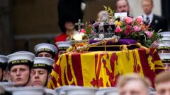 The coffin of Queen Elizabeth II is placed on a gun carriage during the State Funeral of Queen Elizabeth II at Westminster Abbey on September 19, 2022 in London, England.