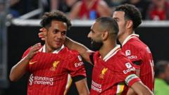 Salah and Carvalho give Liverpool win over Arsenal