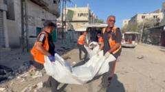 Death and rubble fill streets of Tal Al-Sultan as rescuers dodge Israeli fire