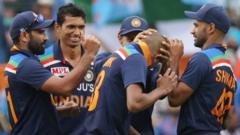 Hardik Pandya celebrates taking a wicket for India against Australia