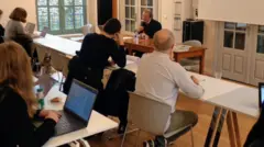 BBC Students listening to a lecturer on the espionage course at Sciences Po Saint-Germain University