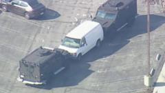 Police surround white van of suspected gunman in Torrance, California
