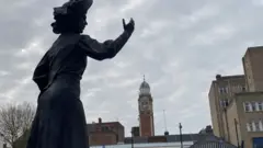 BBC Alice Hawkins statue and the town hall