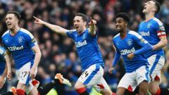 Rangers players celebrate after beating Celtic in a penalty shoot out
