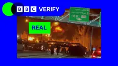 A screenshot of a BBC TikTok video showing an oil depot on fire alongside various comments questioning if it's AI