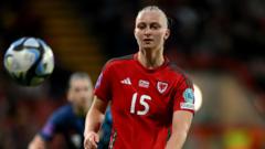 Wales forward Hughes suffers serious knee injury