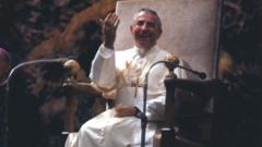 Pope John Paul I waves to crowd in St. Peter's Square, from the window of his private study in the Apostolic Palace after blessing faithful for the first time after his election; 3 September 1978