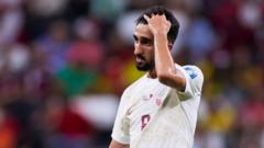 Un jugador de Qatar se lamenta