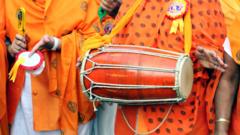 Sikhs playing music instruments