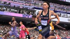 Hinchliffe, Hughes and Lyles progress in 100m