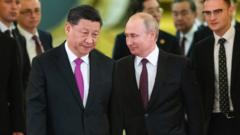 Russian President Vladimir Putin and his Chinese counterpart Xi Jinping enter a hall for the talks at the Kremlin in Moscow on June 5, 2019.