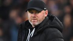 ‘Give Rooney a chance’, says Argyle owner Hallett