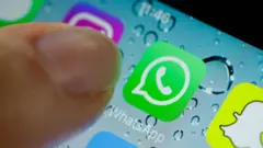 In this photo illustration the logo of WhatsApp is displayed on a smartphone screen.