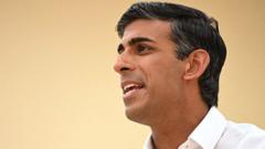 Rishi Sunak speaks to the audience during a Conservative Friends of I