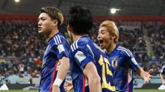 Japan team celebrates