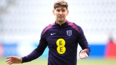 Stones returns to England training after illness