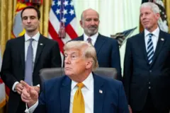 Michael Kratsios, director of the White House Office of Science and Technology Policy, from left, US President Donald Trump, Howard Lutnick, US commerce secretary, and Chris Wright, US energy secretary, during an executive order signing in the Oval Office of the White House in Washington, DC, US, on Monday, June 22, 2026. 
