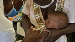 A child gets a malaria vaccination at Yala Sub-County hospital, in Yala, Kenya, on 7 October 2021