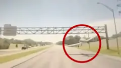 Small plane makes emergency landing on the highway.