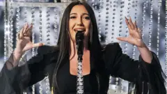 EPA Israel's Yuval Raphael performs the song 'New Day Will Rise' during the dress rehearsal for the second semi-final of the 69th Eurovision Song Contest (ESC) in Basel, Switzerland, 14 May 2025.