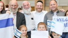 يهود عائدون إلى إسرائيل برعاية منظمة تدعى "النفوس اليهودية المتحدة" Nefesh B'Nefesh