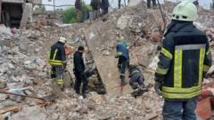 Rescuers search for survivors in the rubble of an apartment block in Chasiv Yar, eastern Ukraine. Photo: 11 July 2022
