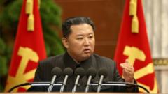 North Korean leader Kim Jong Un speaks during the third enlarged meeting of the political bureau of the 8th Central Committee of the Workers" Party of Korea