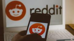 Reddit logo on phone and laptop