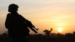 Silhouette of French soldier in the Sahel
