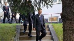 North Korean delegates, including top negotiator Kim Myong-gil, leaving the North Korean embassy in Stockholm - 5 October