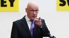 Swinney looks set to be first minister as Forbes backs him