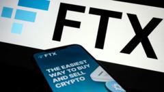 Логотип FTX на экране телефона