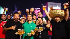 Fans at the Qatar World Cup with glasses of beer