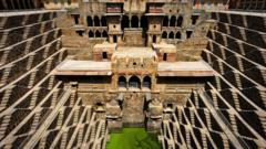 A shot of the incredible Chand Baori Stepwell and it's temple, Abhaneri, Rajasthan, India