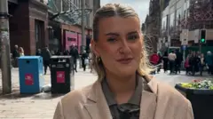 Woman looking at camera on Buchanan Street