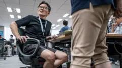 Man wears shorts in Tokyo office