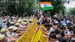 Protesters face off with police in Delhi